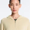 Giacca lunga in maglia con cappuccio Giacca lunga in maglia con cappuccio
