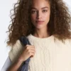 Gilet a maglia intrecciata con scollo rotondo
