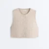 Gilet trapuntato a quadretti floreali