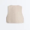 Gilet trapuntato a quadretti floreali