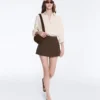 Gonne di panno con tasche in cotone