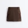 Gonne di panno con tasche in cotone