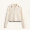 Maglione a collo alto con mini trecce Maglione a collo alto con mini trecce