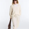 Maglione con scollo a V in maglia a trecce 100% cotone