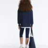 Maglione con scollo a V in maglia a trecce 100% cotone