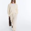 Maglione con scollo a V in maglia a trecce 100% cotone