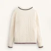 Maglione in maglia a trecce con scollo a V