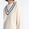 Maglione in maglia con scollo a V a contrasto Maglione in maglia con scollo a V a contrasto