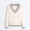 Maglione in maglia con scollo a V a contrasto Maglione in maglia con scollo a V a contrasto