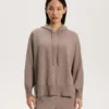 Maglione lungo in maglia con cappuccio Maglione lungo in maglia con cappuccio