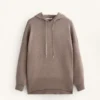 Maglione lungo in maglia con cappuccio Maglione lungo in maglia con cappuccio