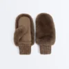 Muffole in pelliccia sintetica con polsino elasticizzato
