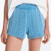 Pantaloncini in maglia a trecce lavata Pantaloncini in maglia a trecce lavata