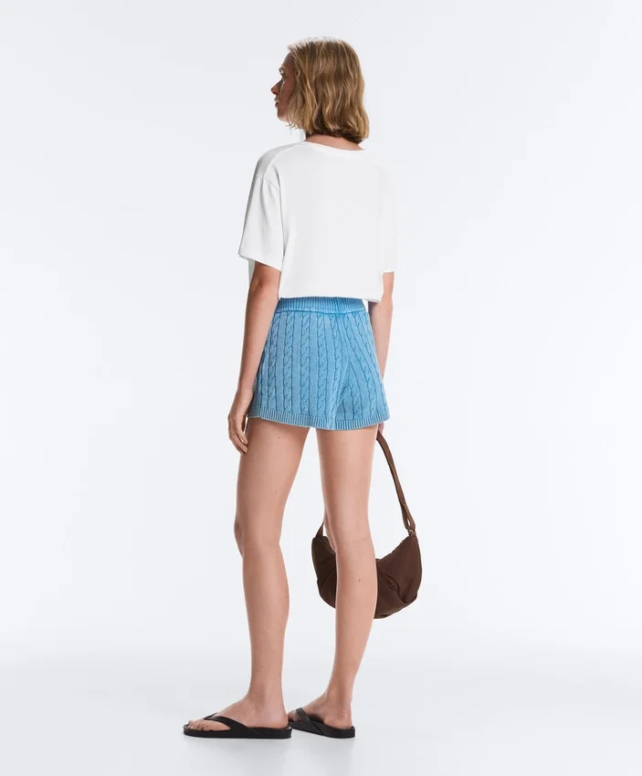 Pantaloncini in maglia a trecce lavata Pantaloncini in maglia a trecce lavata