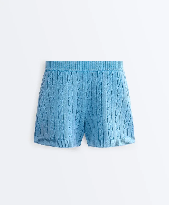 Pantaloncini in maglia a trecce lavata Pantaloncini in maglia a trecce lavata