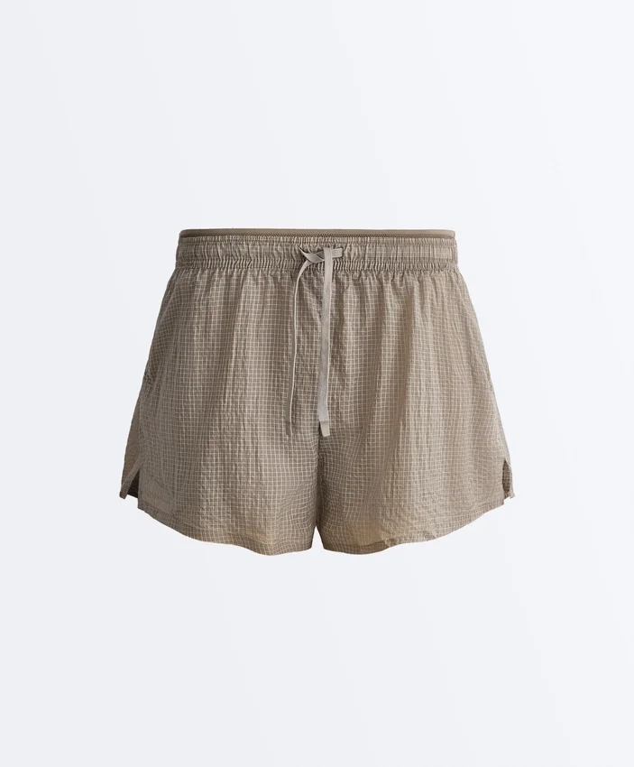 Pantaloncini tecnici 2 in 1 a vita media a quadri Pantaloncini tecnici 2 in 1 a vita media a quadri