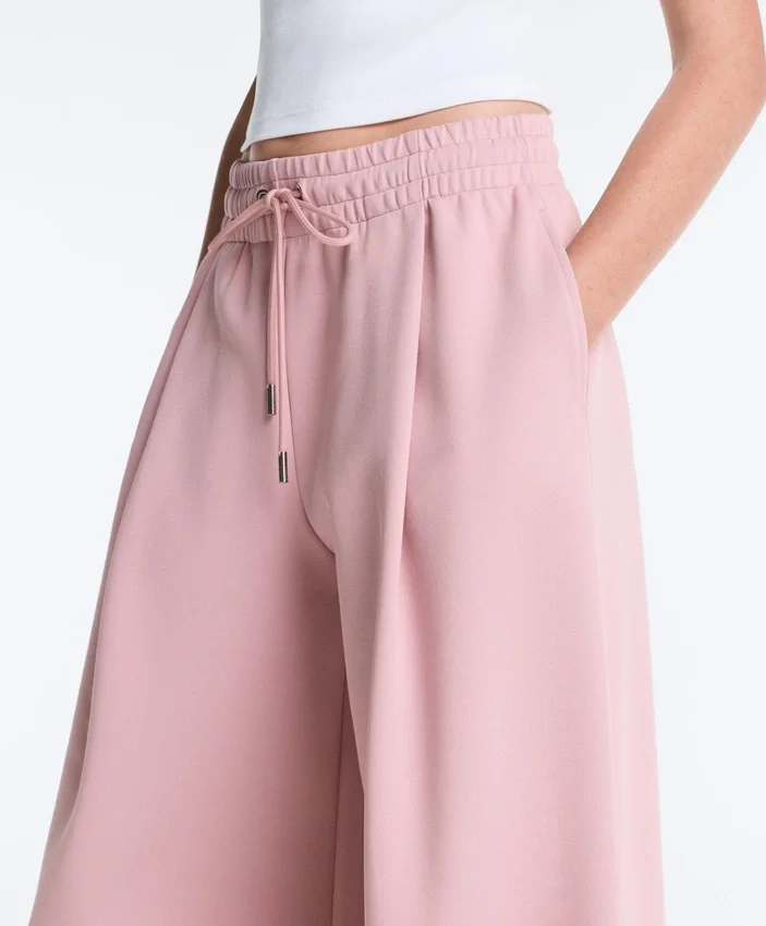 Pantaloni a gamba dritta con pieghe in piqué di cotone Pantaloni a gamba dritta con pieghe in piqué di cotone