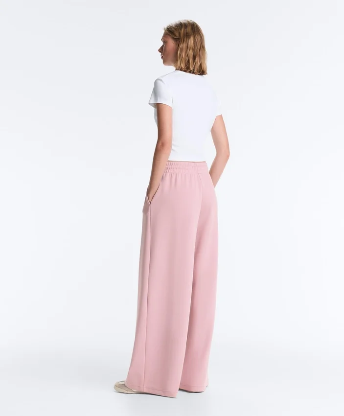 Pantaloni a gamba dritta con pieghe in piqué di cotone Pantaloni a gamba dritta con pieghe in piqué di cotone