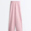 Pantaloni a gamba dritta con pieghe in piqué di cotone Pantaloni a gamba dritta con pieghe in piqué di cotone