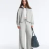 Pantaloni a gamba dritta in piqué melange