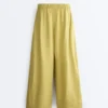Pantaloni a gamba larga in 100% lino con piega laterale