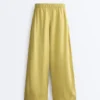 Pantaloni a gamba larga in 100% lino con piega laterale