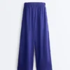 Pantaloni a gamba larga in 100% lino con piega laterale