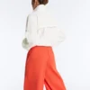 Pantaloni a gamba larga in cotone piqué con pieghe