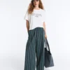 Pantaloni a gamba larga in misto cotone a righe