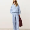 Pantaloni a gamba larga in misto cotone a righe