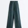 Pantaloni a gamba larga in misto cotone a righe