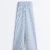 Pantaloni a gamba larga in misto cotone a righe