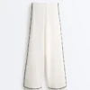 Pantaloni a gamba larga in modal Soft Touch con bordino a contrasto