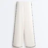 Pantaloni a gamba larga in modal Soft Touch con bordino a contrasto