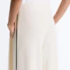 Pantaloni a gamba larga in modal Soft Touch con bordino a contrasto