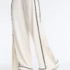 Pantaloni a gamba larga in modal Soft Touch con bordino a contrasto