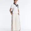Pantaloni a gamba larga in modal Soft Touch con bordino a contrasto