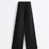 Pantaloni a gamba larga in modal Soft Touch con orlo a giorno Pantaloni a gamba larga in modal Soft Touch con orlo a giorno