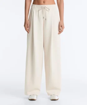 Pantaloni a gamba larga in piqué con pieghe e cotone Pantaloni a gamba larga in piqué con pieghe e cotone