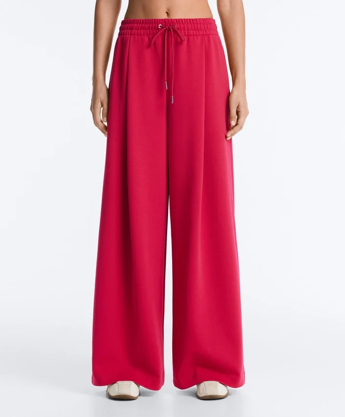 Pantaloni a gamba larga in piqué con pieghe e cotone Pantaloni a gamba larga in piqué con pieghe e cotone