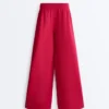 Pantaloni a gamba larga in piqué con pieghe e cotone Pantaloni a gamba larga in piqué con pieghe e cotone