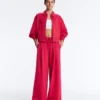 Pantaloni a gamba larga in piqué con pieghe e cotone Pantaloni a gamba larga in piqué con pieghe e cotone