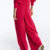 Pantaloni a gamba larga in piqué con pieghe e cotone Pantaloni a gamba larga in piqué con pieghe e cotone