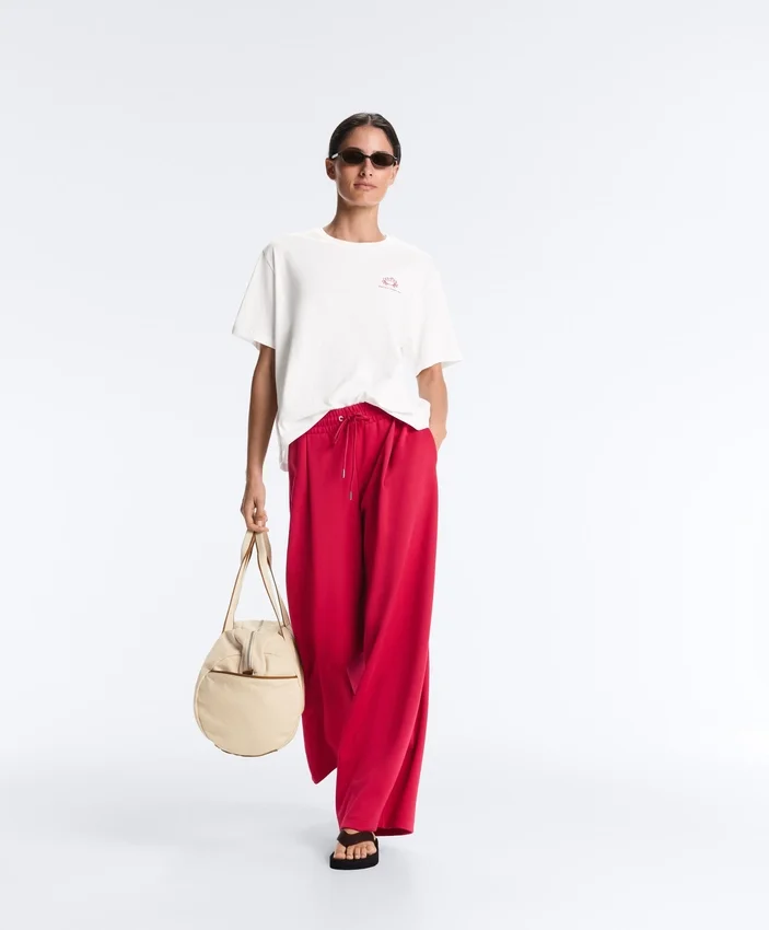 Pantaloni a gamba larga in piqué con pieghe e cotone Pantaloni a gamba larga in piqué con pieghe e cotone