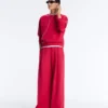 Pantaloni a gamba larga in piqué con pieghe e cotone Pantaloni a gamba larga in piqué con pieghe e cotone