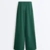 Pantaloni a gamba larga in piqué di cotone con pieghe Pantaloni a gamba larga in piqué di cotone con pieghe