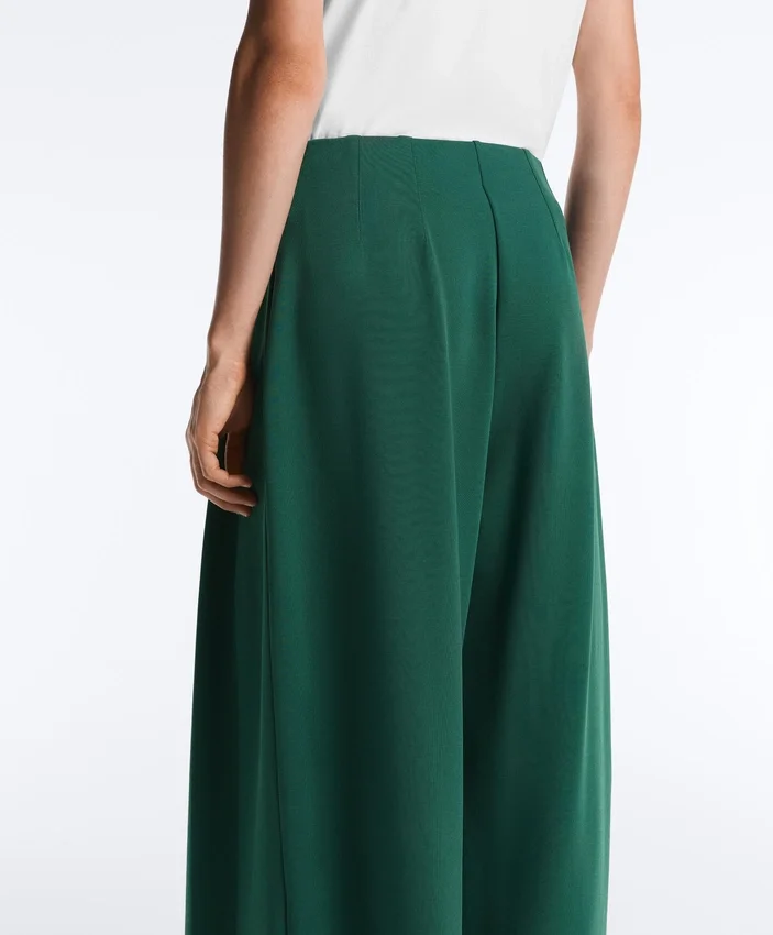 Pantaloni a gamba larga in piqué di cotone con pieghe Pantaloni a gamba larga in piqué di cotone con pieghe