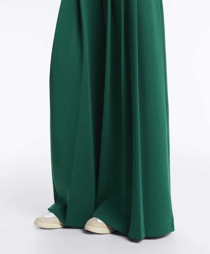 Pantaloni a gamba larga in piqué di cotone con pieghe Pantaloni a gamba larga in piqué di cotone con pieghe