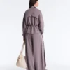 Giacca in modal Soft Touch con vita regolabile e collo alto Giacca in modal Soft Touch con vita regolabile e collo alto
