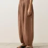 Pantaloni a palloncino a righe in 100% lino Pantaloni a palloncino a righe in 100% lino